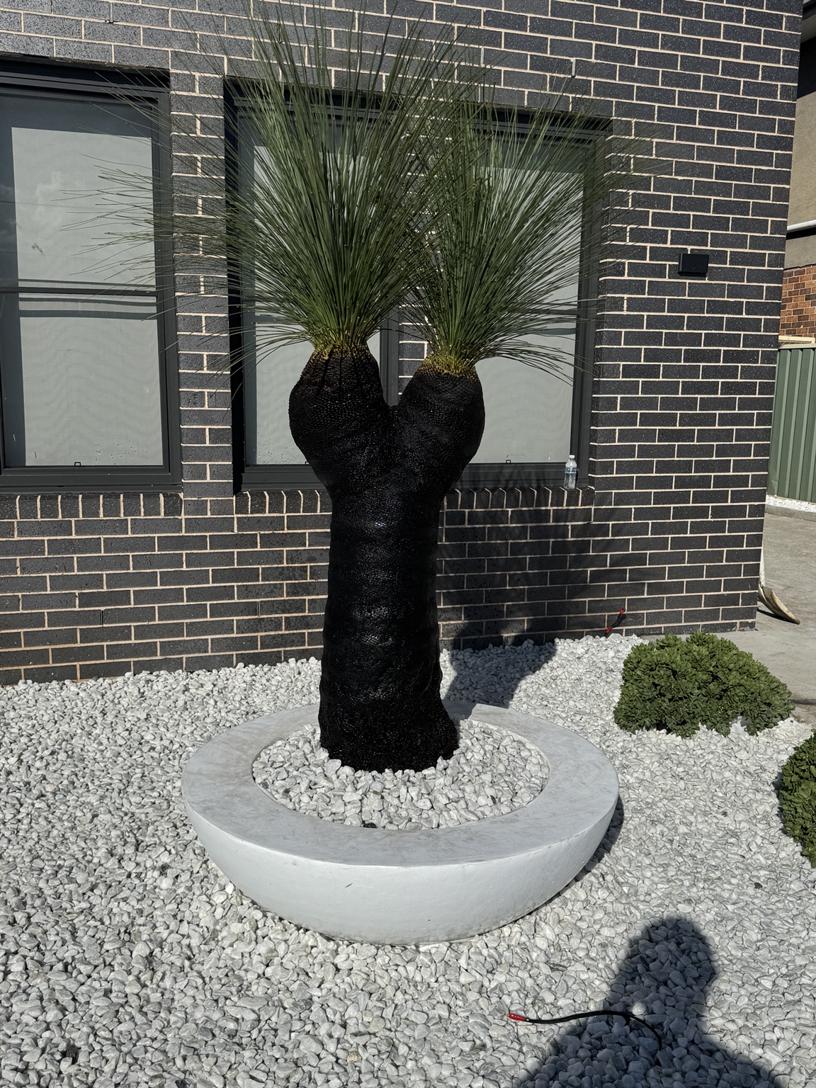 Feature planting & pebble finish
